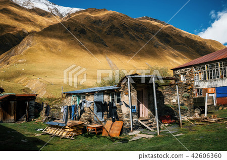 Ruined house against brown hill in Georgia. 42606360