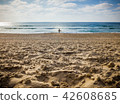 a man going to surfing 42608685