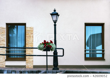 Lantern, wall and two windows. Lantern, wall and two windows. 42609052