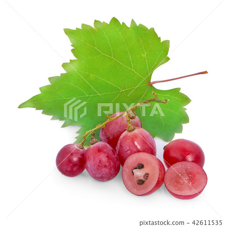 Ripe red grape. Pink bunch with leaves isolated Ripe red grape. Pink bunch with leaves isolated 42611535