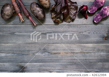 Background with various violet vegetables 42612994
