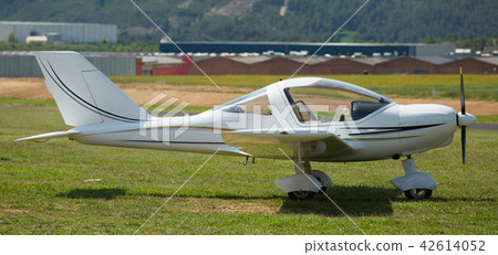 Sport airplane standing on airfield Sport airplane standing on airfield 42614052