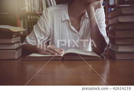 vintage tone of Reading a book concept vintage tone of Reading a book concept 42614219