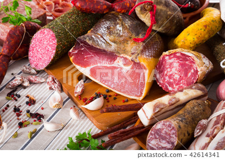 Variety of meats on table Variety of meats on table 42614341