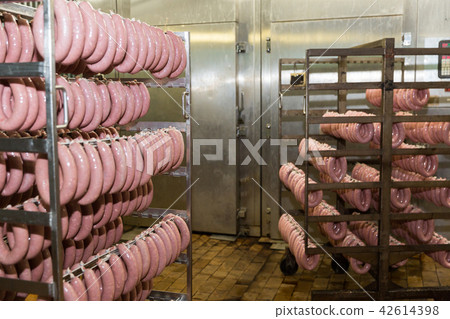 Sausages hanging on racks Sausages hanging on racks 42614398