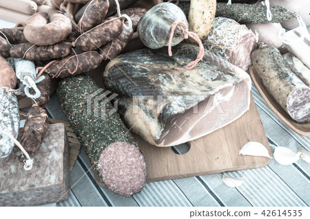 Variety of meats and sausages on table Variety of meats and sausages on table 42614535