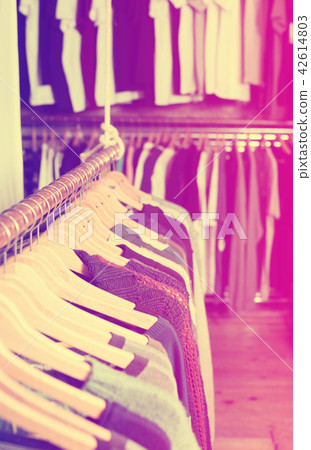 Different assortment of colorful clothing in boutique Different assortment of colorful clothing in boutique 42614803