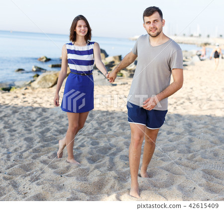 Young loving couple walking 42615409