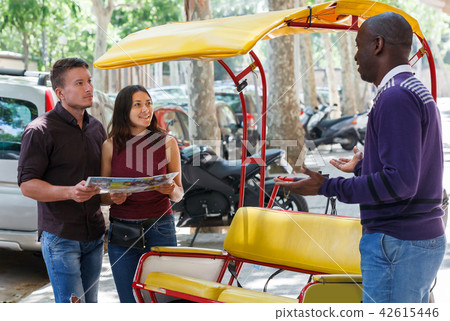 Pretty girl with boyfriend traveling on rickshaw Pretty girl with boyfriend traveling on rickshaw 42615446