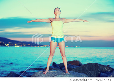 Adult sporty female doing aerobics 42616434