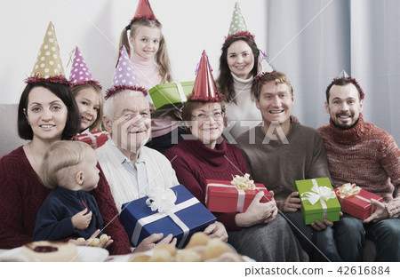 Friendly family making numerous photos Friendly family making numerous photos 42616884