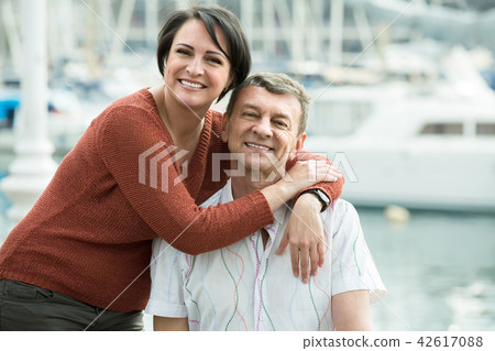 couple hugging outdoors at spring day couple hugging outdoors at spring day 42617088