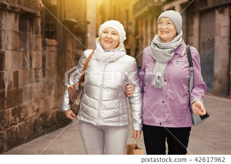 Elderly women walking around town 42617962
