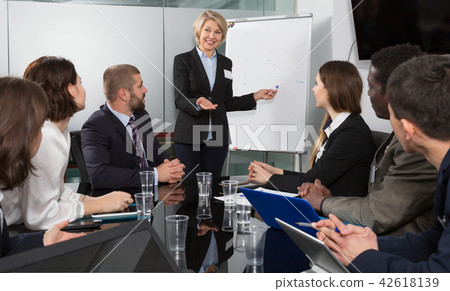 Businesswoman doing presentation to colleagues 42618139