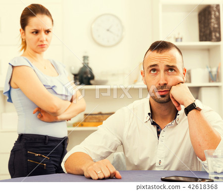 Man is upset because he quarrel with his wife 42618368