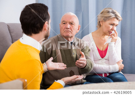 Grandfather instructs grandson Grandfather instructs grandson 42619005