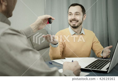 Mature and manager sign contract car lease 42619161