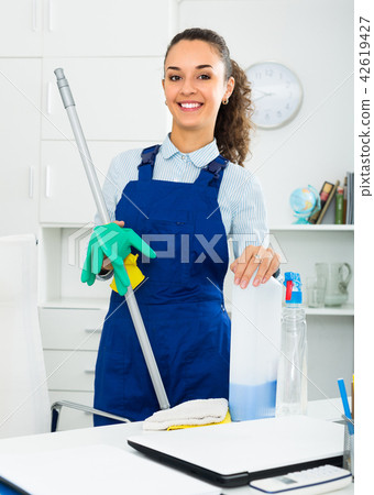 Female professional cleaner in office. 42619427