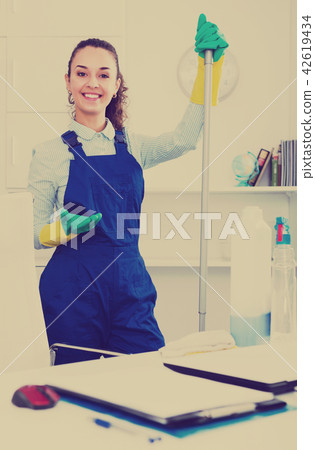 Female professional cleaner in office. 42619434
