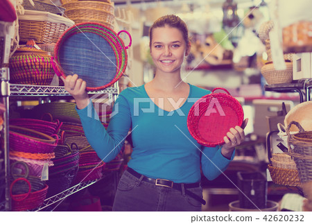 teenager girl with multicolor wicker basket teenager girl with multicolor wicker basket 42620232