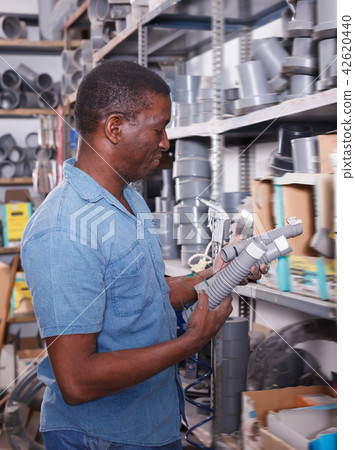 Handsome man looking for construction supplies 42620440