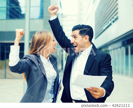 Businessman and his boss woman are signed successful contract 42621211