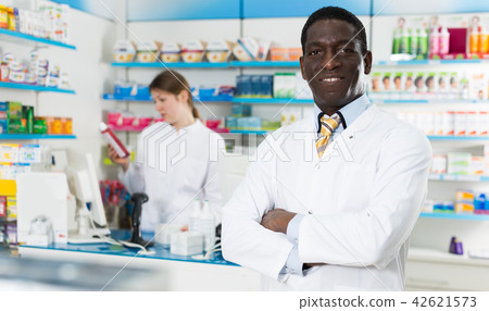 positive male pharmacist of pharmacy positive male pharmacist of pharmacy 42621573
