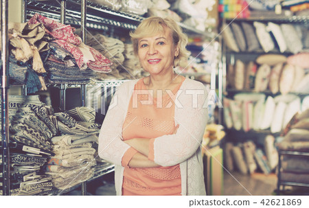 woman consumer in textile shop 42621869