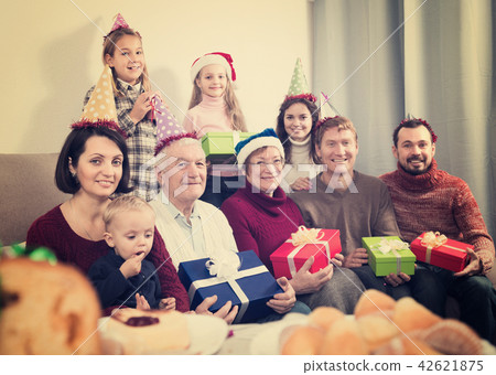 Grandparents 65-75 years old with children are photographing best moments Grandparents 65-75 years old with children are photographing best moments 42621875