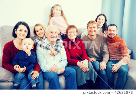 Friendly large family making numerous photos Friendly large family making numerous photos 42621878