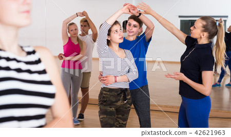 Group of teen dancing salsa in dance studio 42621963