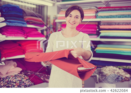 Woman choosing fabric 42622084