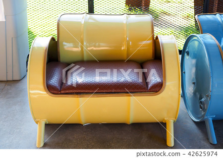 Sofa recycled from old yellow oil tank Sofa recycled from old yellow oil tank 42625974