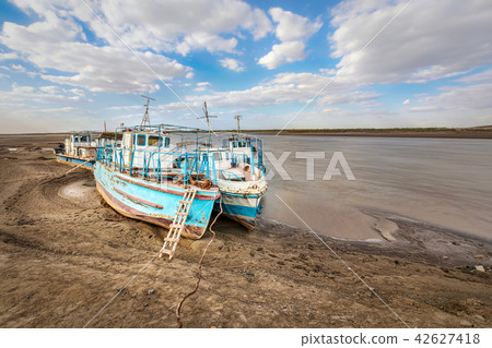 Ships on  the side of Amu Darya river, Uzbekistan 42627418