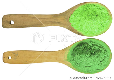 green and light green  powder on wooden spoons  42628987