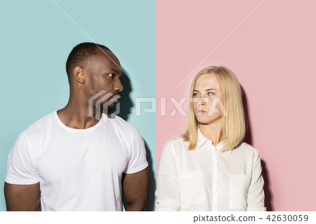 Man and woman posing at studio during quarrel Man and woman posing at studio during quarrel 42630059
