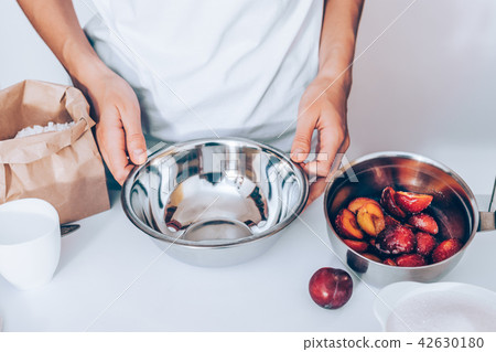 Young woman wearing white t-shirt  42630180