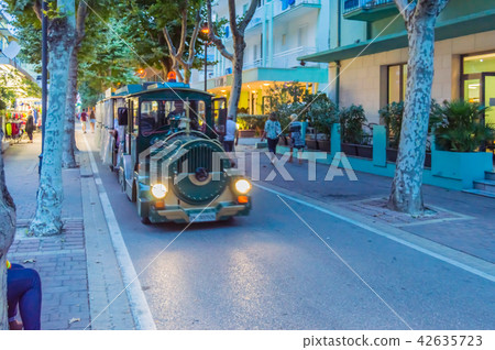 Locomotive of a small tourist train in the streets 42635723