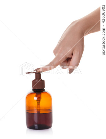 bottle with liquid soap in hand 42636902