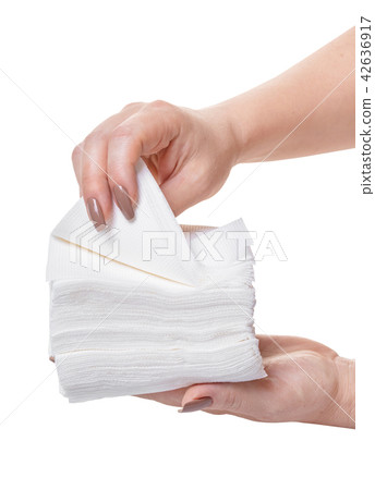 pack of napkins in hands pack of napkins in hands 42636917