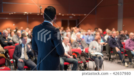 Public speaker giving talk at business event. Public speaker giving talk at business event. 42637980