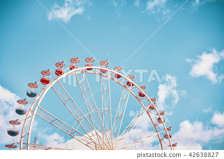 Retro stylized picture of a Ferris wheel. 42638827