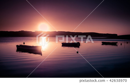 Fishing boats and sunset at the river Fishing boats and sunset at the river 42638970