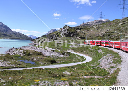 The Bernina Express going through Bianco Lake The Bernina Express going through Bianco Lake 42641289
