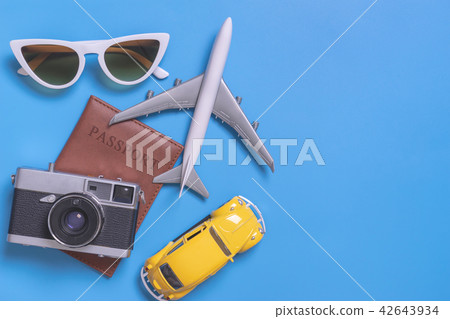 Summer travel with plane camera passport car 42643934