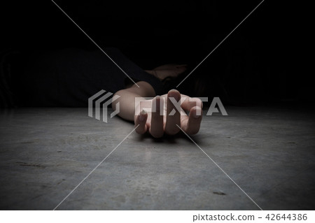 The dead woman's body. Focus on hand 42644386