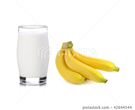 Glass of milk with banana over white background Glass of milk with banana over white background 42644544