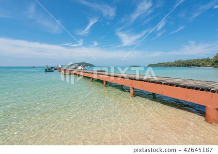 Wooden pier with boat in Phuket, Thailand. 42645187