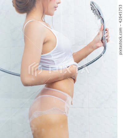 sexy young woman taking a shower 42645753
