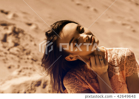 pretty girl in pink dress in desert pretty girl in pink dress in desert 42649648